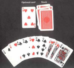 It would be good play to take the ♥ 5 as it gives chances of a set of 5s of a sequence in hearts. The ♣ might be discarded.